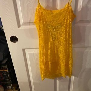 Yellow Spaghetti strap with a bling on the front